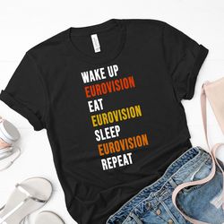 fire saga shirt, igniting the stage t shirt, echoes of passion t shirt, fire saga t shirt