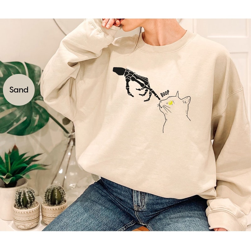 Skeleton Hand Cute Cat Graphic Hoodies for Women, Funny Skeleton Cat Halloween Long Sleeve Shirts, Unisex Halloween Skeleton Sweatshirts - 2.jpg