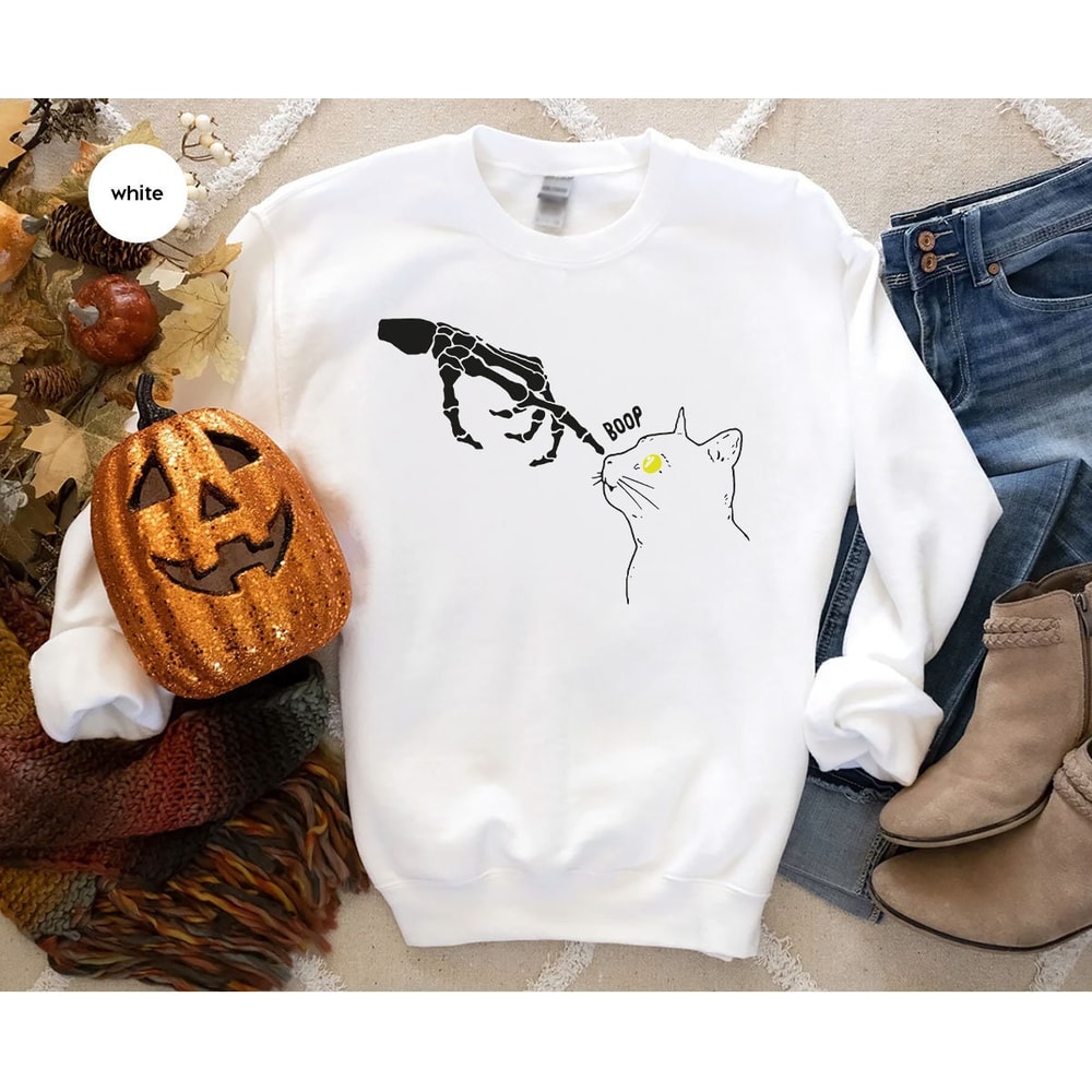 Skeleton Hand Cute Cat Graphic Hoodies for Women, Funny Skeleton Cat Halloween Long Sleeve Shirts, Unisex Halloween Skeleton Sweatshirts - 3.jpg