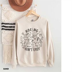 hoeing aint easy, gardening sweatshirt, gift for gardener, funny garden gift, spring gardening sweatshirt, garden pun sw