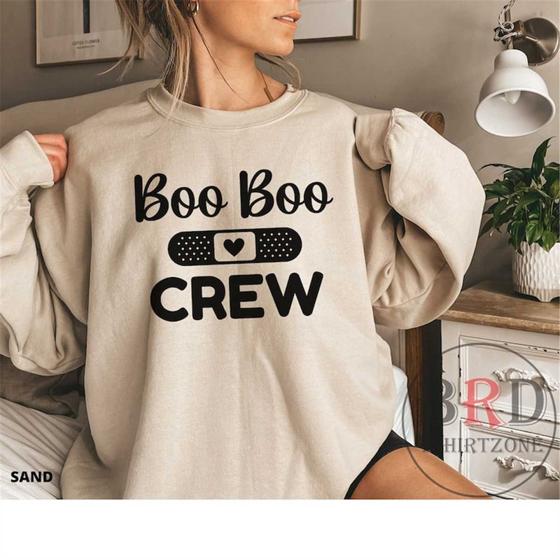 MR-1662023154732-boo-boo-crew-nurse-sweatshirt-er-nurse-gift-nurse-team-sand.jpg