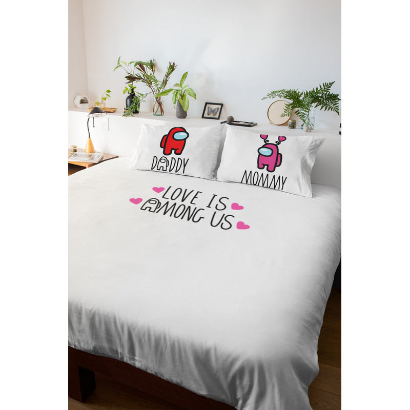 mockup-of-a-duvet-and-two-pillows-in-a-bedroom-with-plant-decorations-31281.png