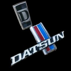 Datsun 1500 Grill Emblems