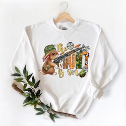 the hunt is on shirt, christian easter shirt, easter carrot and camouflage eggs shirt, easter shirt gift for women,hunte