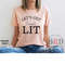 MR-1762023101022-lets-get-lit-english-teacher-shirt-gift-for-teacher-reading-heather-peach.jpg