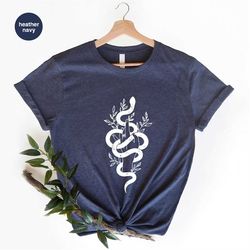 trendy snake clothing, aesthetic animal graphic tees, floral hand shirts, women vneck t shirt, celestial gifts, reptile