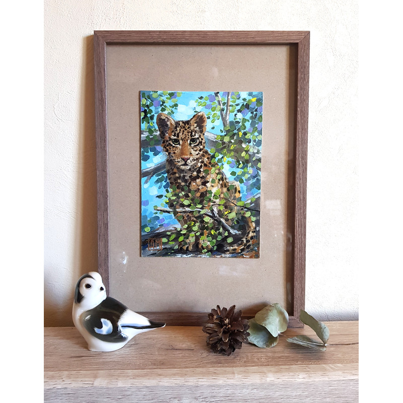 Leopard in the leaves of a tree.3.jpg