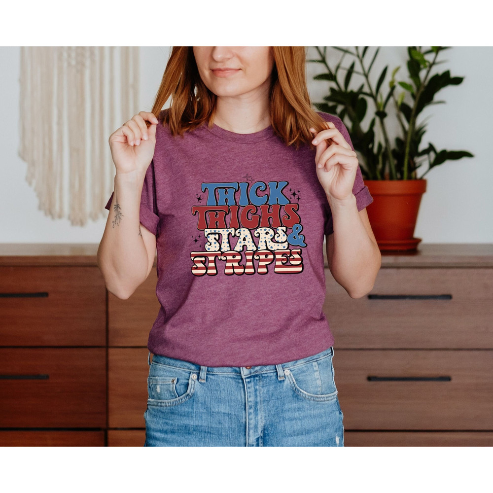 Thick Thighs Stars And Stripes Graphic Tee, 4th Of July Shirts, American Flag Shirt, Retro American Flag T-shirts, Fourth of July Tee, Gifts - 1.jpg