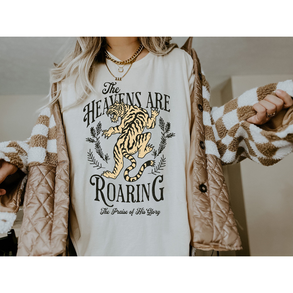 Christian Shirts The Heavens are Roaring Shirt Oversized Bible Verse Faith Based Apparel Christian Gifts for Her On Earth As it is in Heaven - 1.jpg