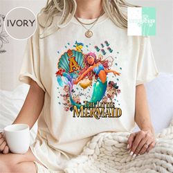 retro little mermaid movie ariel black t shirt, live action tiana princess sweatshirt, black queen magic shirt, disney g