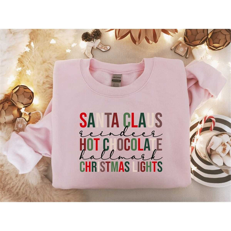MR-2362023141813-santa-claus-sweatshirt-hot-chocolate-shirt-christmas-light-image-1.jpg