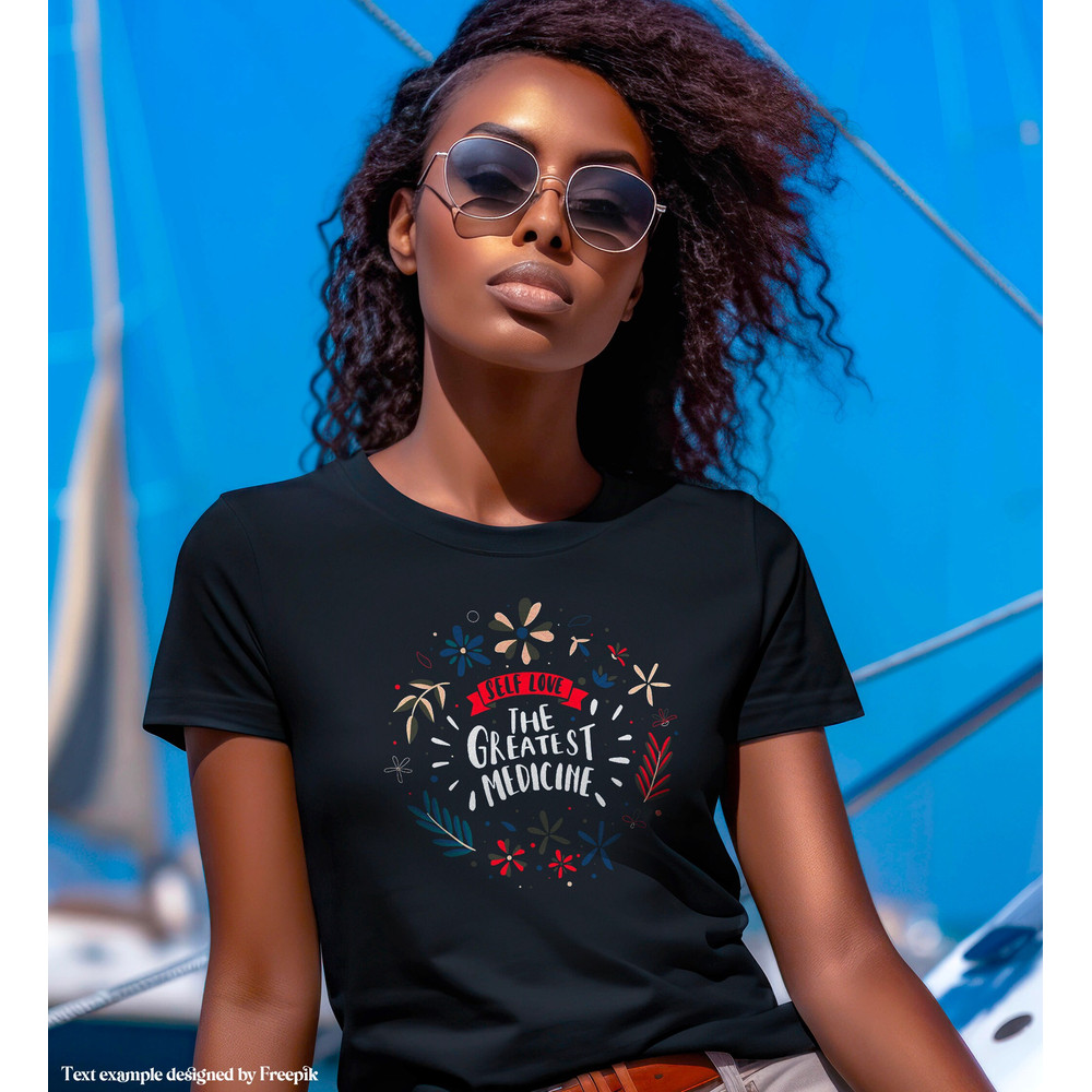 Mockup of a Woman wearing a Black Bella Canvas 3001 T-shirt, Female Model, Girl Styled Shirt Mockup, Nautical Tshirt w sailboat background - 3.jpg