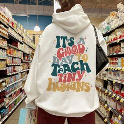 its a good day to teach tiny humans teacher sweatshirt, teach love inspire, teacher