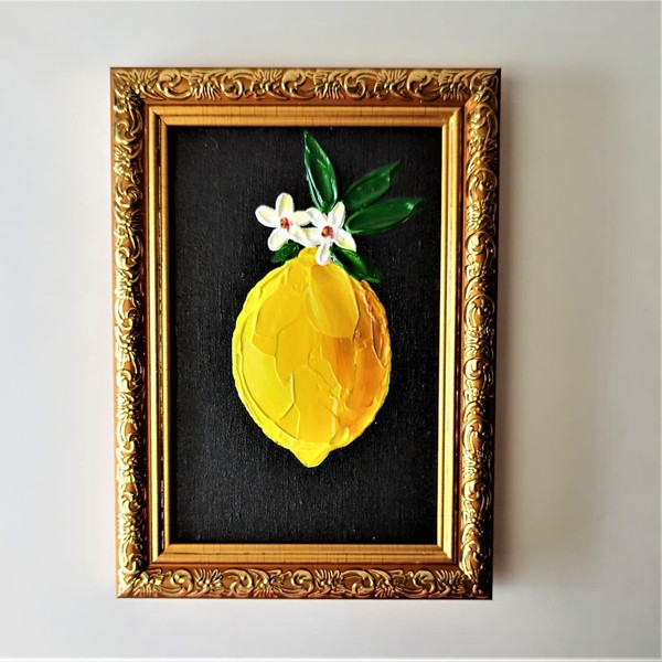 Lemon-textured-painted-on-black-canvas-board-in-frame.jpg