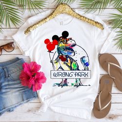 wrong park shirt, disney shirt, disney wrong park shirt, mickey shirt, dinosaur shirt, dinosaur cartoon, tyrannosaurus s