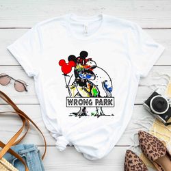 wrong park t-shirt, disney shirt, disney 2023 shirt, tyrannosaurus t-shirt, disneyland theme park shirt, disney dinosaur