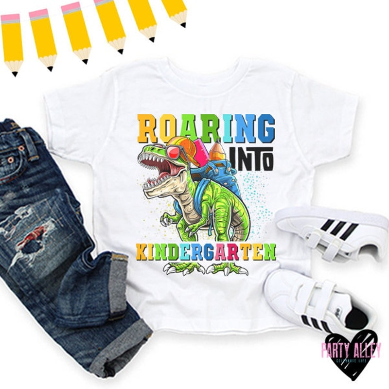 Roaring into kindergarten shirt  T-rex back to school tee  First day of school t-shirt  First day of kindergarten  T-rex with backpack - 1.jpg