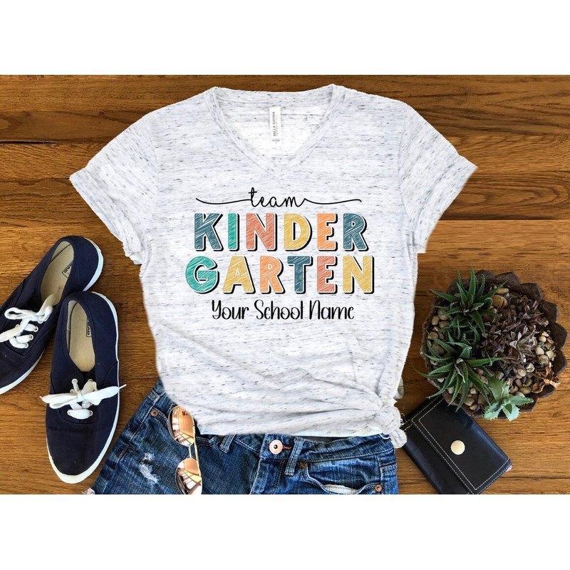 Team Kindegarten Personalized Tee, Back To School Teacher Shirt, Kindergarten Teacher Unisex V Neck Graphic Tee T-Shirt - 1.jpg