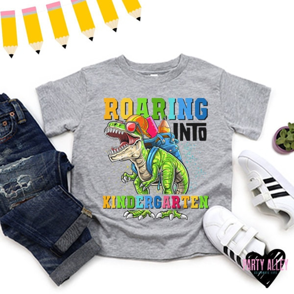 Roaring into kindergarten shirt  T-rex back to school tee  First day of school t-shirt  First day of kindergarten  T-rex with backpack - 2.jpg