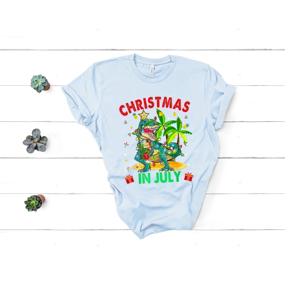 Christmas in July Tee, Holiday Santa Claus Tee, Family Summer Vacation Tee, Santa At The Beach, Xmas In Summer Tee, Tropical Christmas Tee - 2.jpg