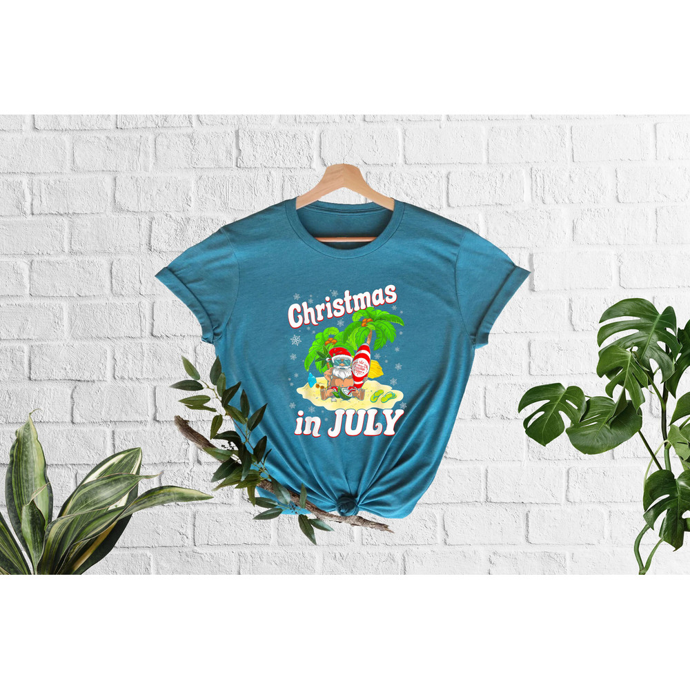 Christmas in July T-shirt, Santa At The Beach, Summer Vacation, Summer Santa, Xmas In July Shirt, Xmas In Summer Shirt, Beach Vacation Tee - 6.jpg