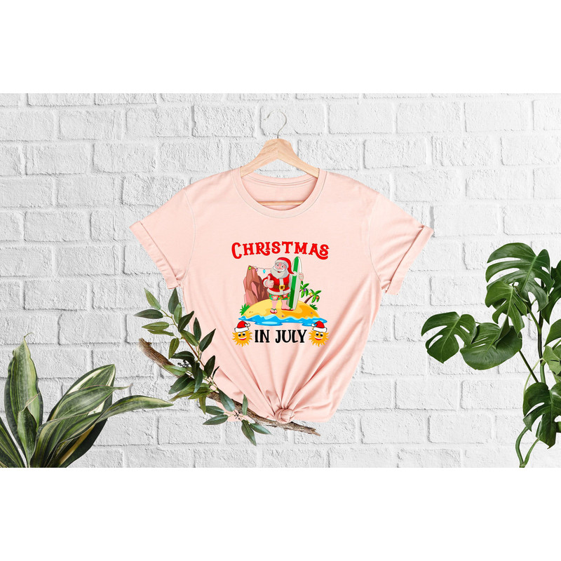 Christmas In July Shirt, Funny Summer T-Shirt, Summer Santa Shirt, Xmas In Summer, Xmas In July, Funny Christmas Shirt, Santa At The Beach - 1.jpg