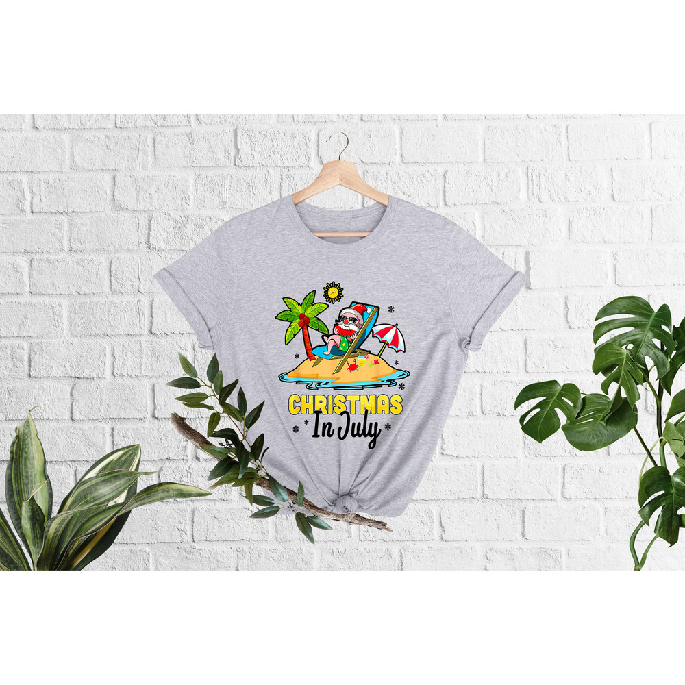 Christmas in July Shirt, Xmas in July Tshirt, Summer Santa Shirt,Santa At The Beach, Funny Summer Gift,Tropical Christmas, Funny Beach Vibes - 2.jpg