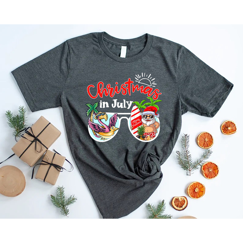 Christmas In July Shirt,Santa Beach Shirt,Summer Santa T-shirt,Christmas Flamingo Shirt,Christmas At The Beach,Xmas in July,Tropical Xmas - 1.jpg