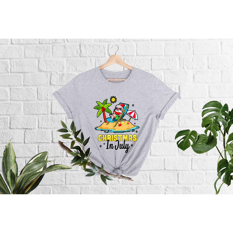 Christmas in July Shirt, Xmas in July Tshirt, Summer Santa Shirt,Santa At The Beach, Funny Summer Gift,Tropical Christmas, Funny Beach Vibes - 2.jpg