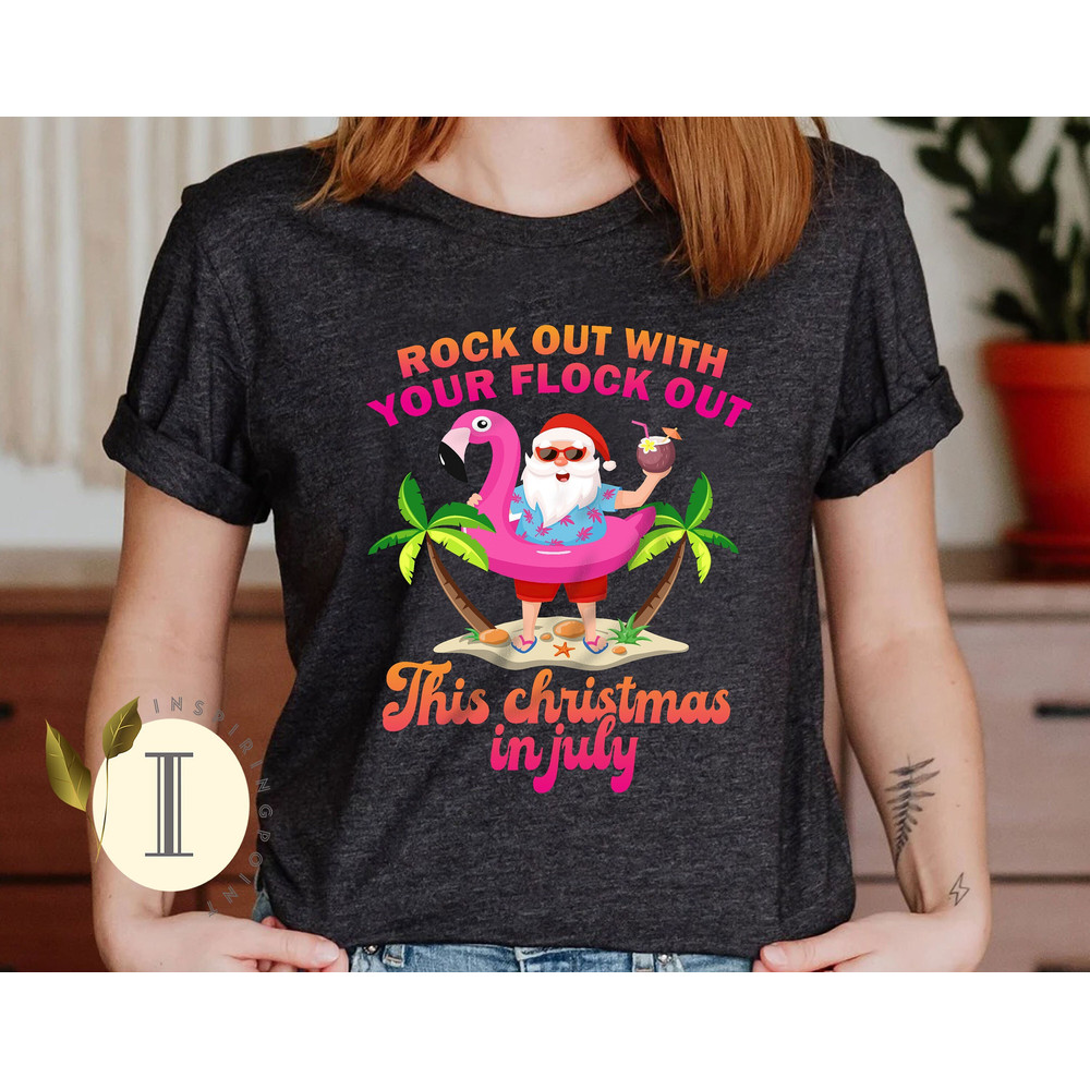 Rock Out with Your Flock Out Christmas in July Flamingo Shirt, Beach Santa, Beach Christmas Shirt, Xmas in Summer Shirt - 1.jpg
