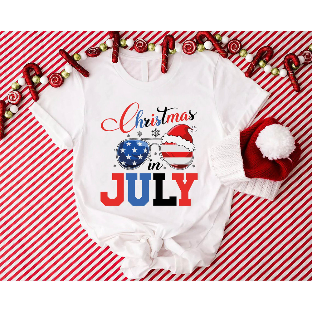Christmas In July Shirt, Summer Santa Claus Shirt, Funny Santa Summer Beach Vacation Shirt, Summer Holiday Tee, Christmas on The Beach Shirt - 1.jpg