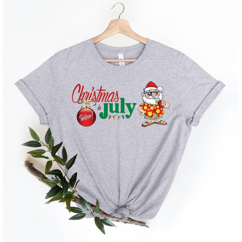 Christmas in July Tee, Santa At The Beach, Xmas In Summer Tee, Holiday Santa Claus Tee, Family Summer Vacation Tee, Tropical Christmas Tee - 3.jpg