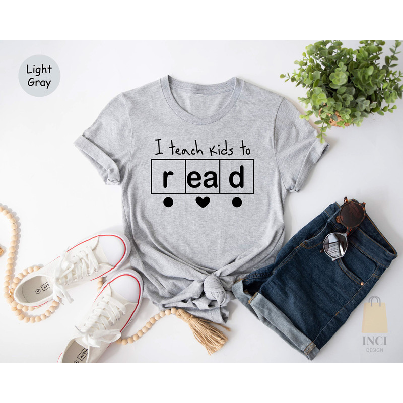 I Teach Kids To Read Shirt, Teacher Shirts, Funny Teacher Shirt, Reading Teacher Shirt, Reading Specialist Shirt, Spelling Shirt, School Tee - 3.jpg