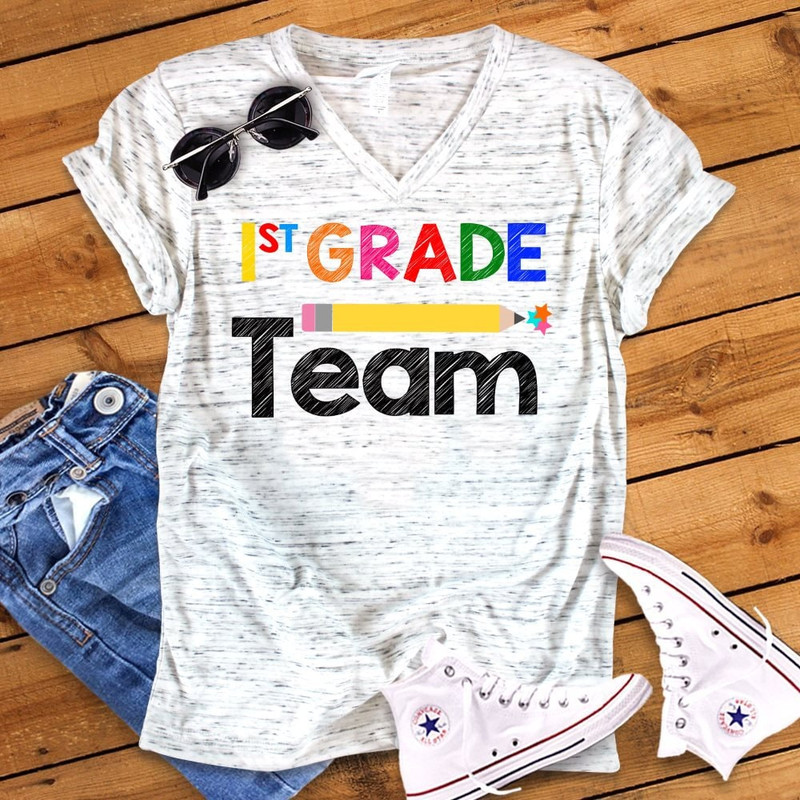 1st Grade Team Back To School First Grade Teacher Novelty Graphic Unisex V Neck Graphic Tee T-Shirt - 1.jpg