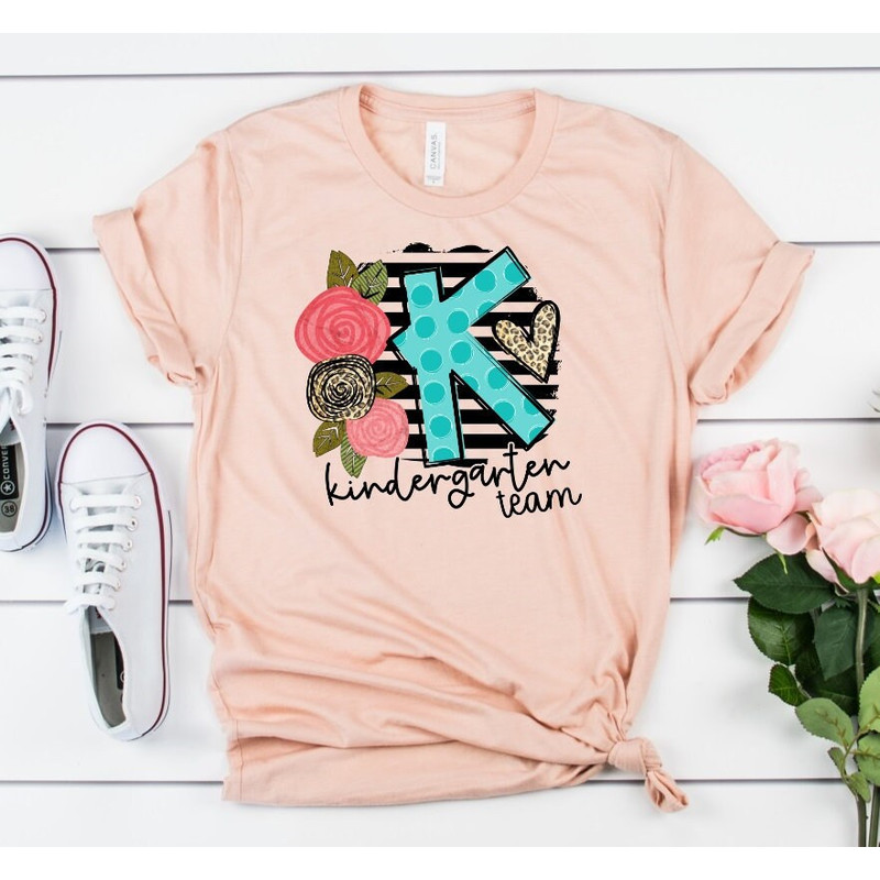 Kinder Team Back To School Kindergarten Teacher Novelty T-Shirt - 1.jpg