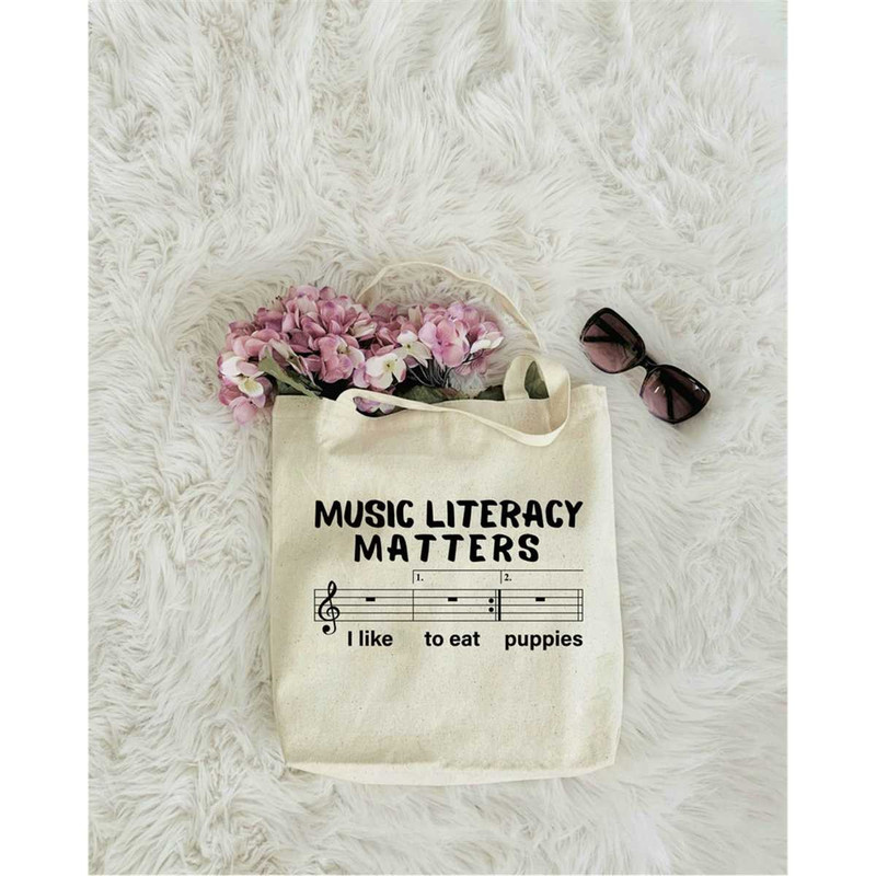 MR-17202315374-music-literacy-matters-i-like-to-eat-puppies-tote-bag-tote-image-1.jpg