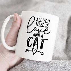 all you need is love and a cat, cat lover coffee mug, gift for cat mom, cat mom, cute cat coffee mug, i love cats mug, c