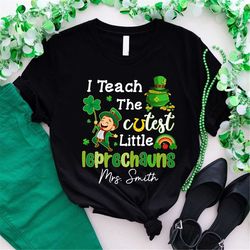 custom teacher st patrick's day shirt, i teach the cutest leprechauns shirt, teacher name shirt, shamrock shirt, st patt