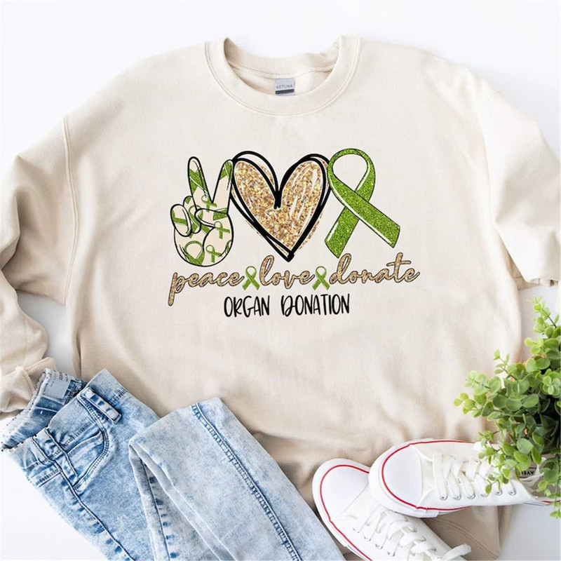 MR-4720231541-organ-donation-sweatshirt-peace-love-donate-sweatshirt-organ-image-1.jpg