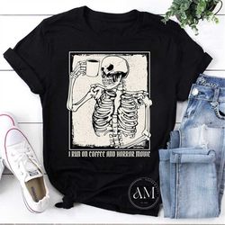 run on coffee and horror movies i coffee drinking skeleton vintage t-shirt, horror coffee shirt, drinking skeleton shirt