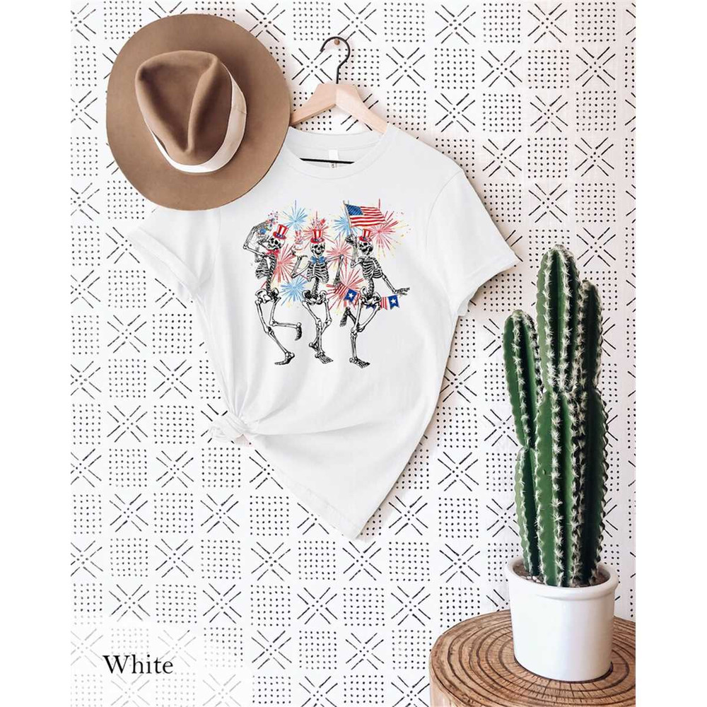 MR-572023103917-fourth-of-july-skellies-t-shirt-skeletons-celebrating-the-4th-image-1.jpg