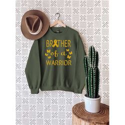 brother of warrior sweatshirt, child cancer support shirt, childhood cancer shirt, gold cancer ribbon, pediatric cancer