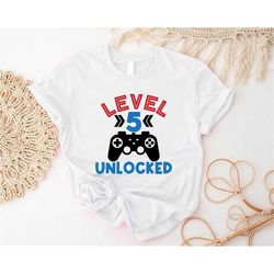 level unlocked birthday shirt, gamer 5th birthday t-shirt, game lover birthday cute gift, kids birthday party outfit, fi