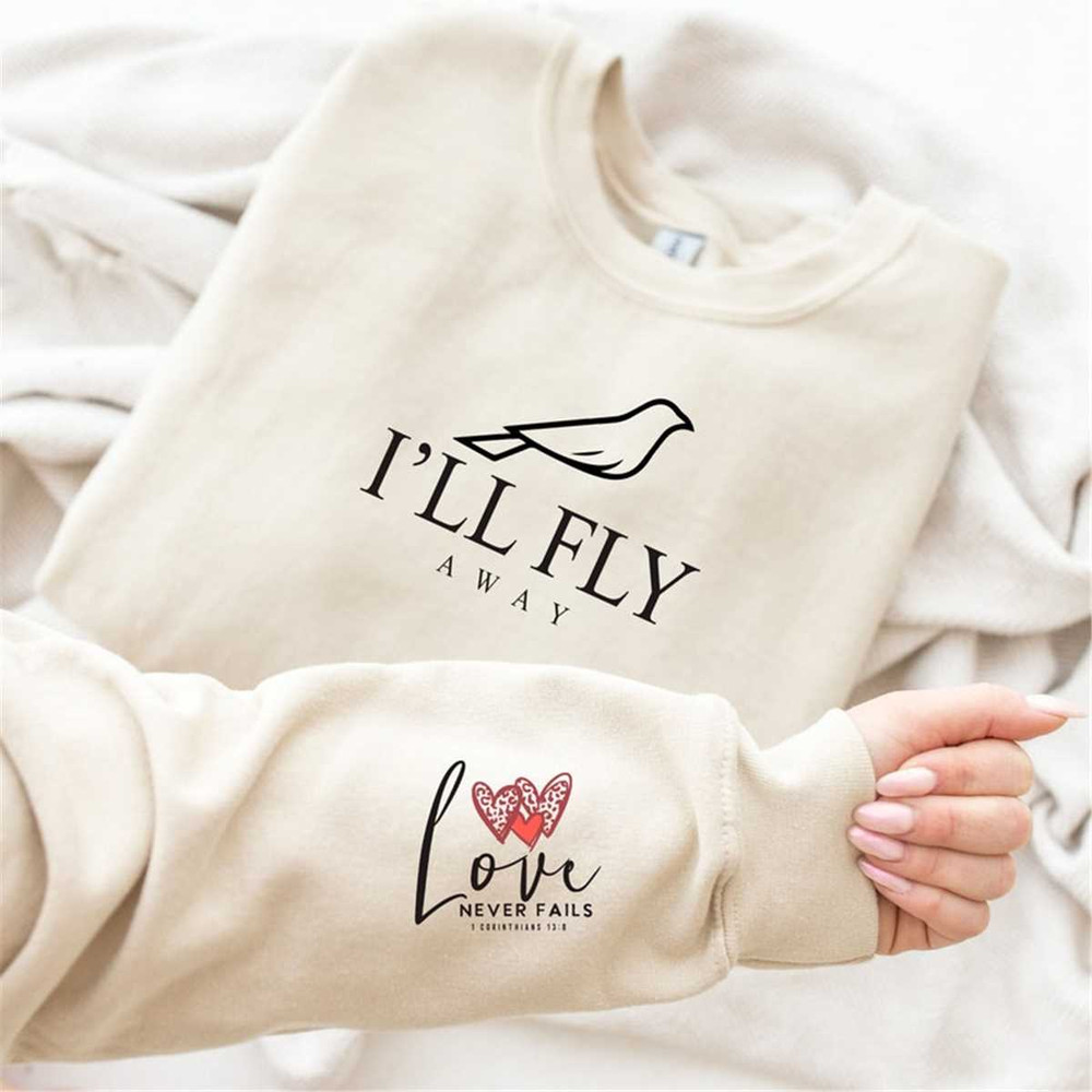 MR-57202316459-ill-fly-away-sweatshirtlove-never-fails-image-1.jpg