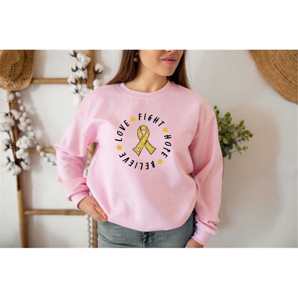 MR-572023185116-gold-cancer-love-fight-believe-sweatshirt-pediatric-cancer-image-1.jpg