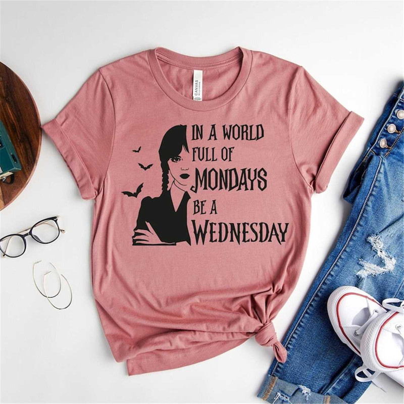 MR-6720239437-in-a-world-full-of-mondays-be-a-wednesday-shirt-wednesday-image-1.jpg