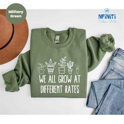 we all grow at different rates, kindergarten sweatshirt, elementary sweatshirt, teacher sweatshirt, funny teacher sweats
