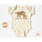 MR-67202323189-baby-onesie-wild-and-free-floral-bear-baby-bodysuit-baby-image-1.jpg