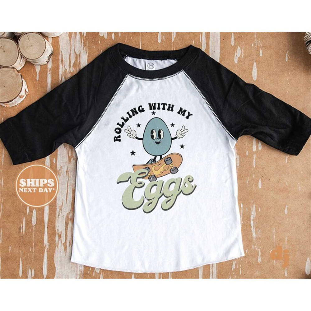 MR-7720239305-kids-easter-shirt-rolling-with-my-eggs-kids-retro-tshirt-image-1.jpg
