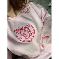embroidered angels roll their eyes crewneck sweatshirt